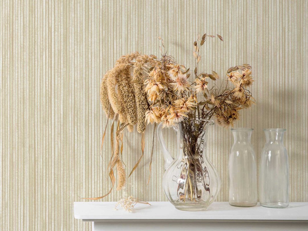 Close detail of natural grasscloth textured wallpaper on a finished wall